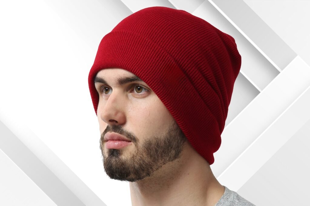Custom red knit beanie hat manufactured by Fasa Apparel Pakistan