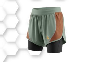 Dual-layer green and brown running shorts with black compression inner lining, designed for comfort, flexibility, and athletic performance.