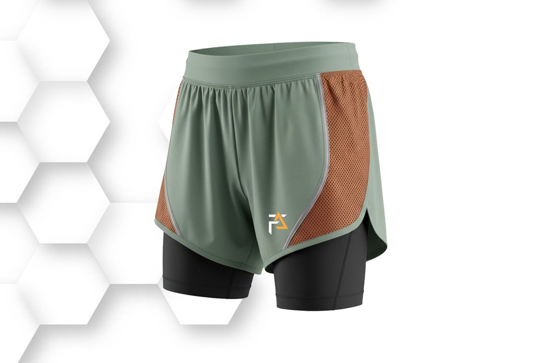 Dual-layer green and brown running shorts with black compression inner lining, designed for comfort, flexibility, and athletic performance.